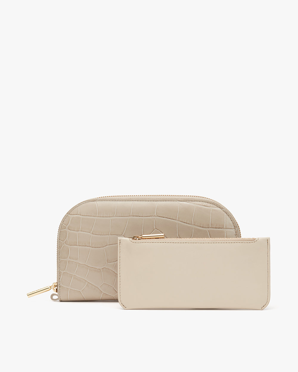 Two small zippered pouches on a plain background.