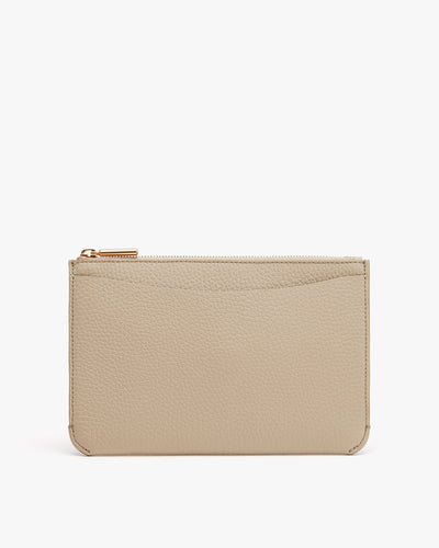Small zippered pouch standing upright against a plain background.