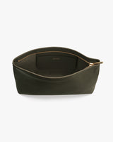 Open travel bag showcasing its spacious interior and a zippered pocket inside.