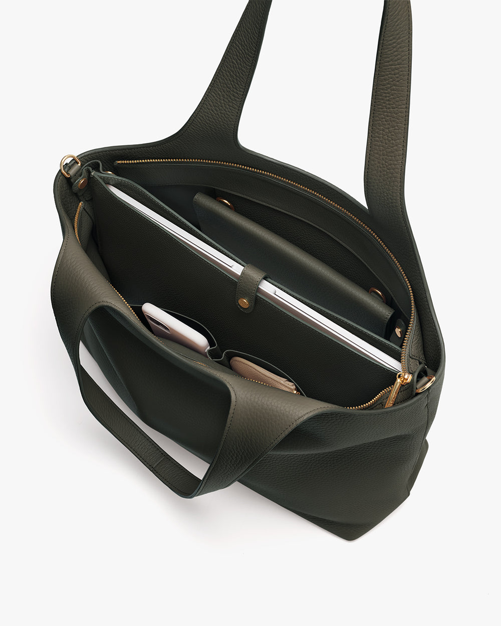 Open travel bag with laptop and other items inside.