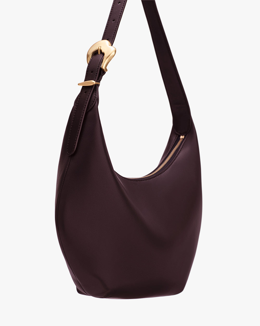 Bag with a single strap and curved shape, featuring a zippered top closure.
