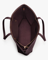 Open tote bag with handles and zippered top.