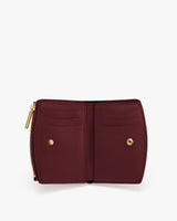 Open wallet with card slots and zippered coin section