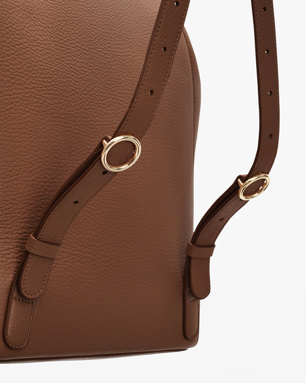Backpack straps with adjustable gold buckles