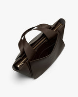 Top view of an open tote bag with handles and multiple compartments.