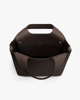 Open handbag with handles and two interior pockets.