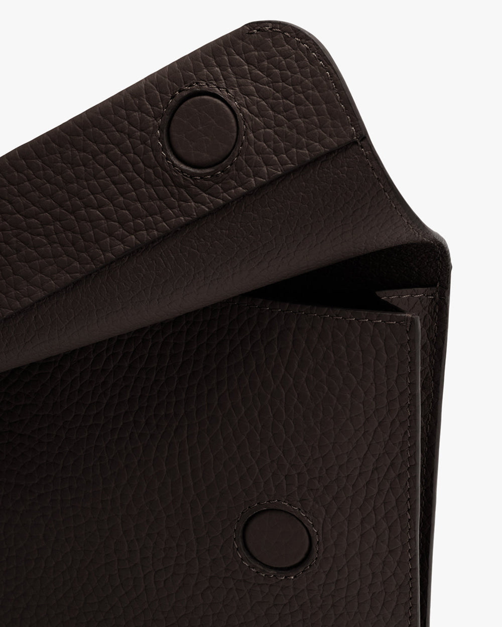 Pebbled leather flap with two snap buttons
