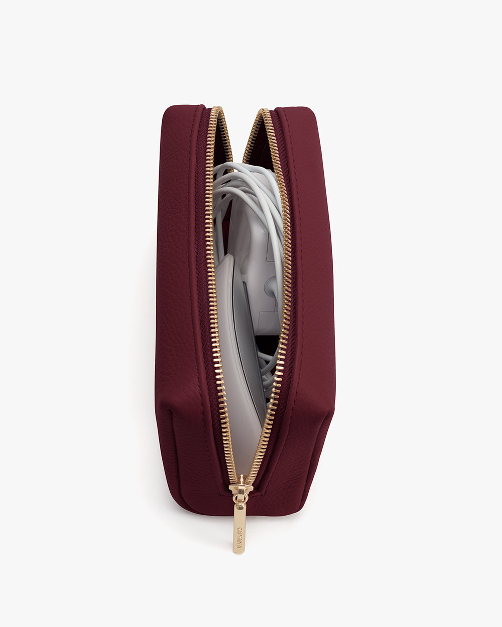 Open zippered pouch with electronic cords inside