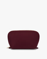 Small rounded pouch with a zipper on top