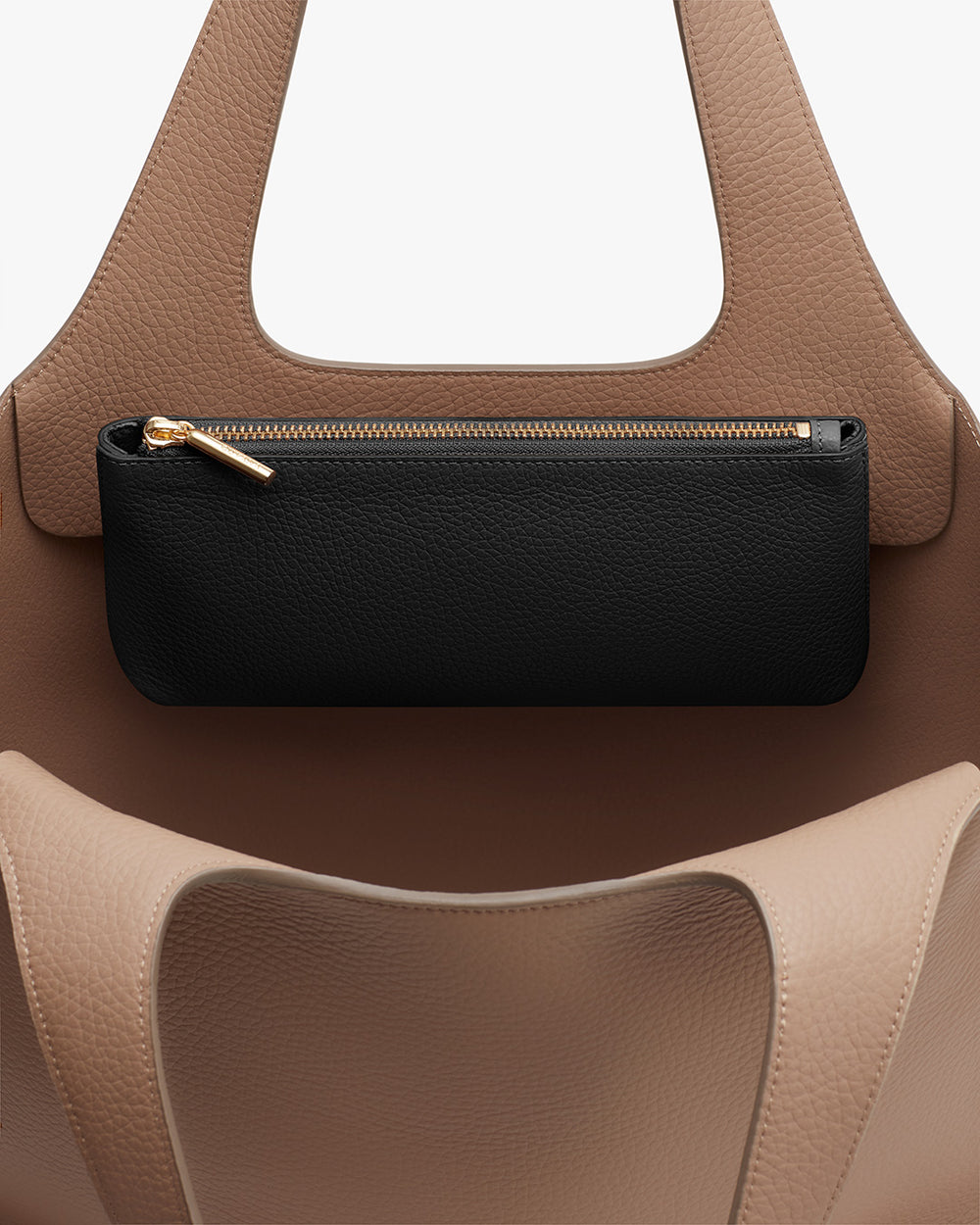 Handbag with a small pouch attached to the handle.