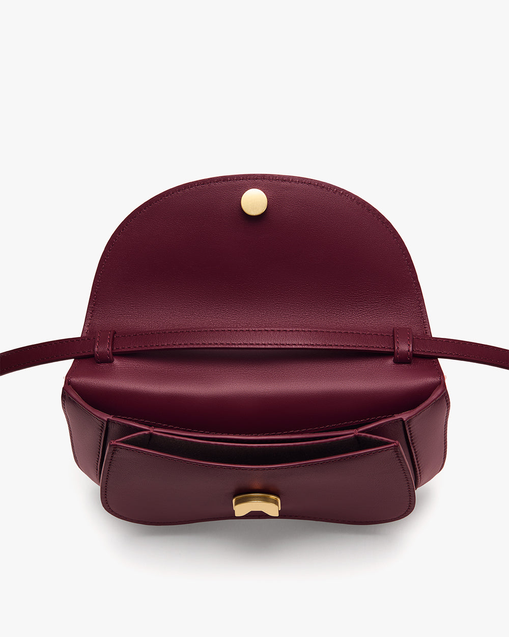 Open handbag with front pocket and clasp on display