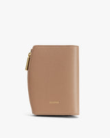 A small textured leather wallet with a zip closure and embossed brand name.