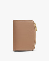 A small leather zippered wallet standing upright.