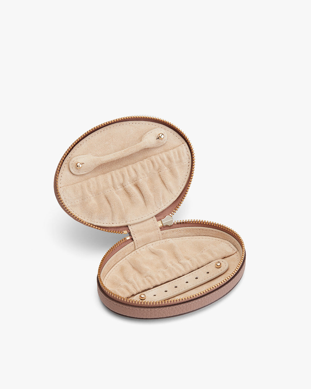 Open oval jewelry case with interior compartments.