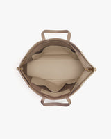 Top view of an open bag with handles and interior pockets.