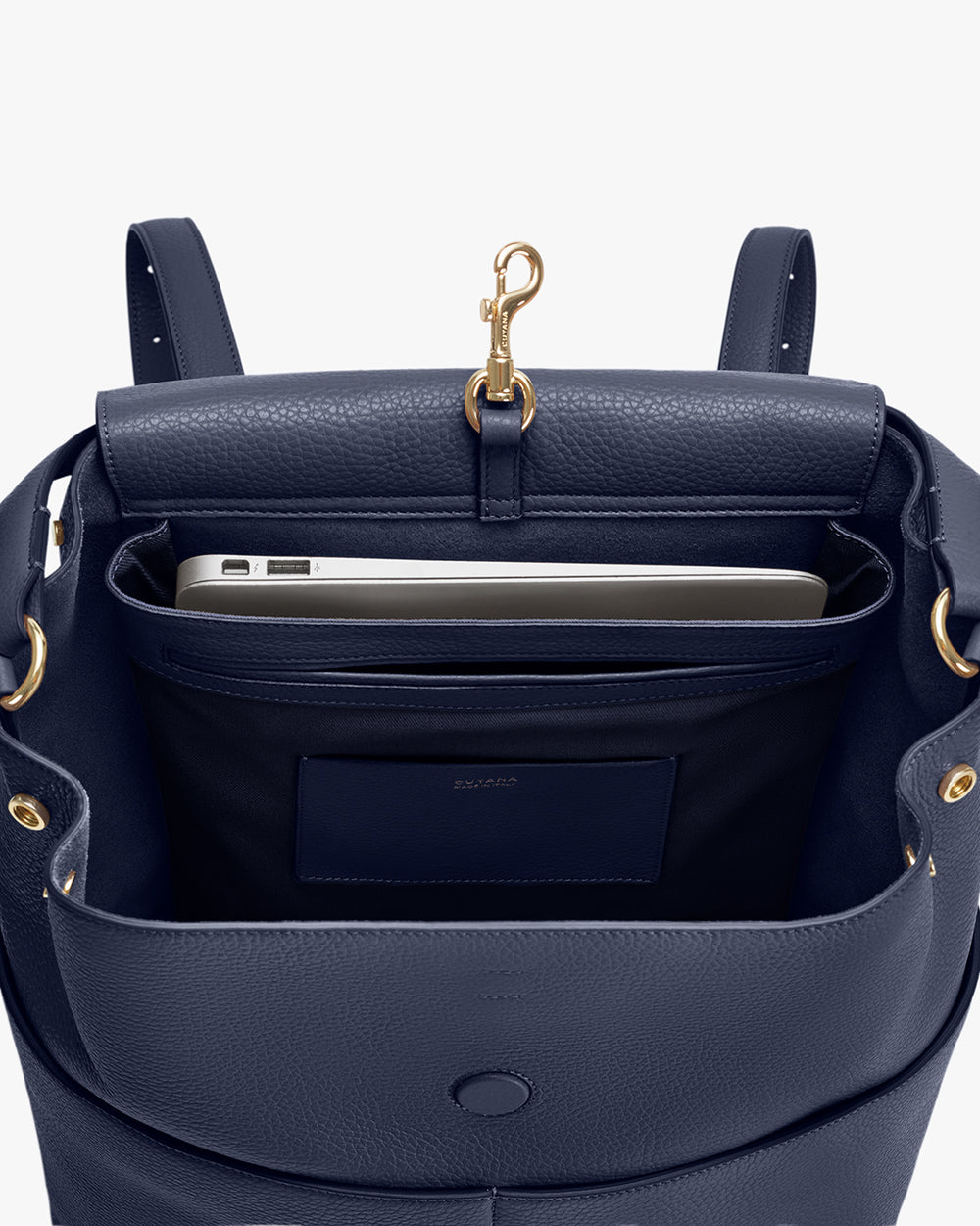 Open backpack with a laptop inside