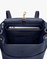 Open backpack with a laptop inside