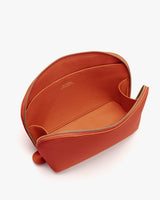 Open makeup bag with a zipper on a white background.