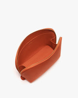 Open zipper on rectangular pouch viewed from above