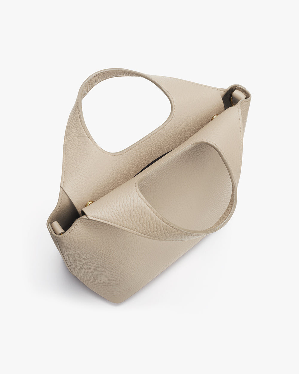 Minimalist handbag with large handle opening and a structured design.
