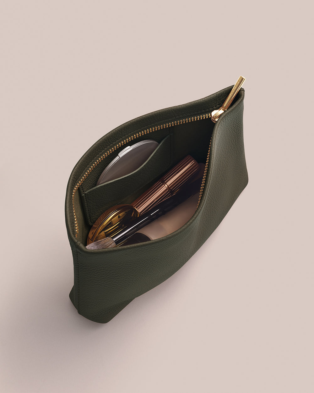 Open pouch with cosmetics inside