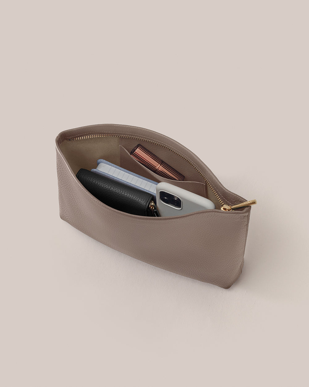Pouch containing wallet, phone, and a few other small items.