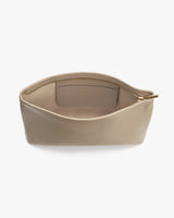 Open small zipper pouch on white background
