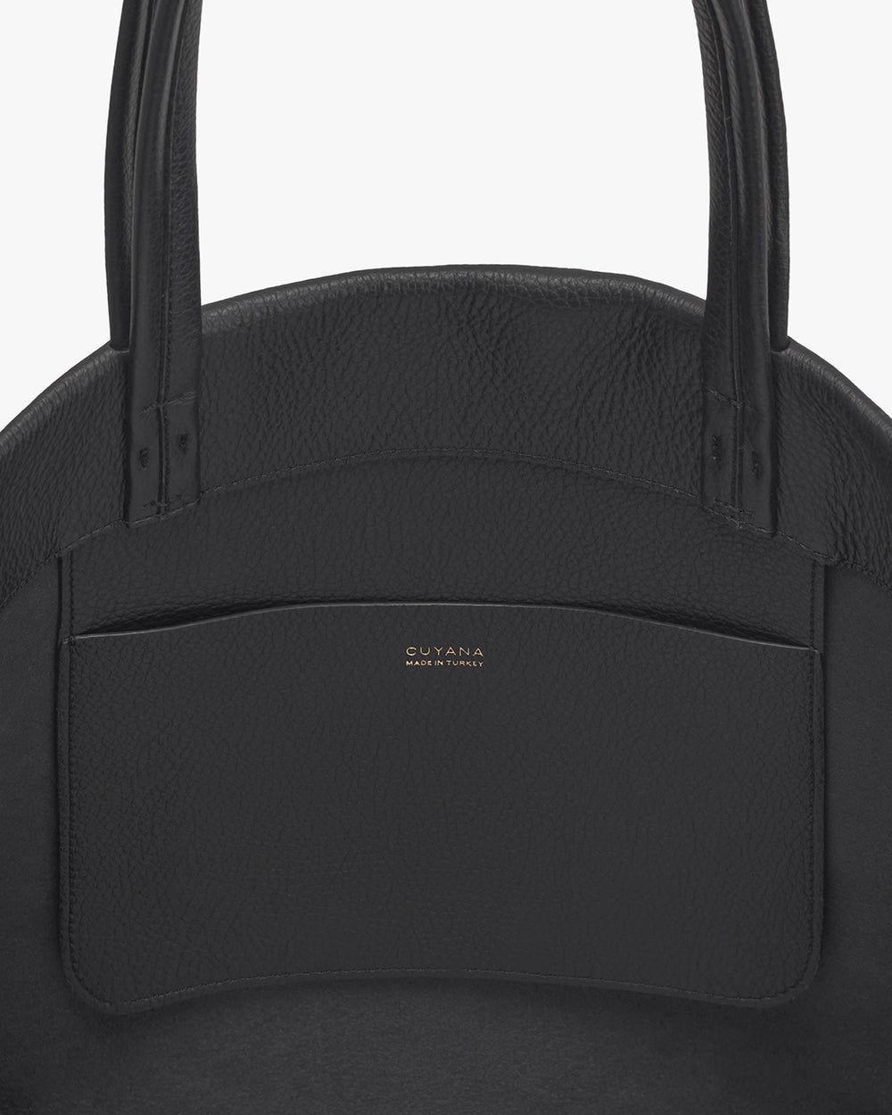 Close-up of a handbag with two handles and a front pocket.