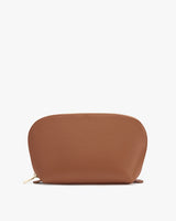 Woman's purse with zipper on white background.