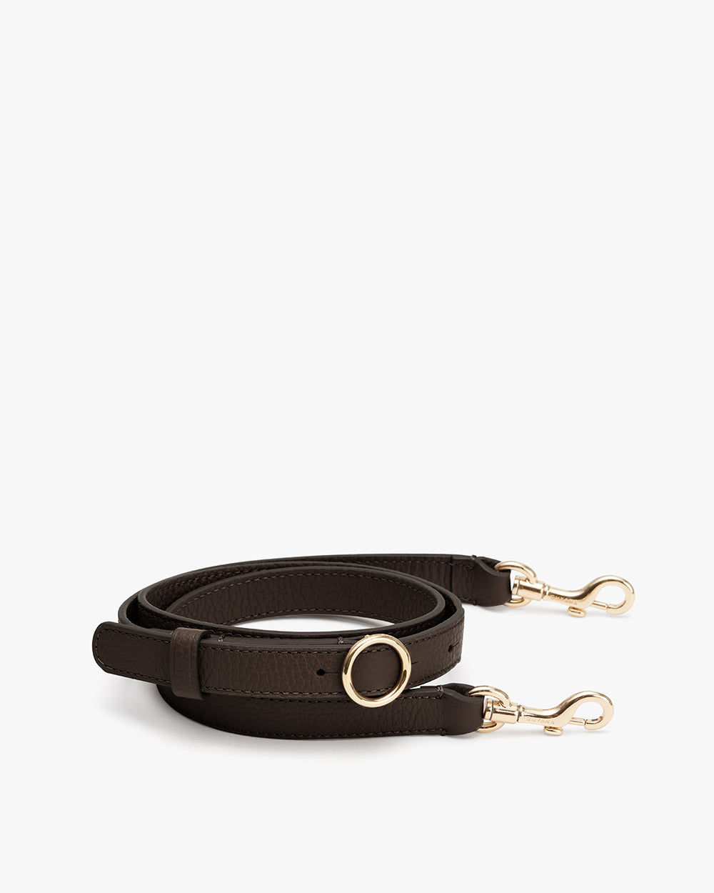 Adjustable bag strap with gold clips on each end.