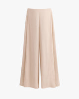 Wide-leg trousers on a plain background.