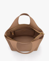 Open tote bag with handles and a visible inner pocket.