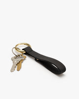Keyring with two keys and a leather strap loop