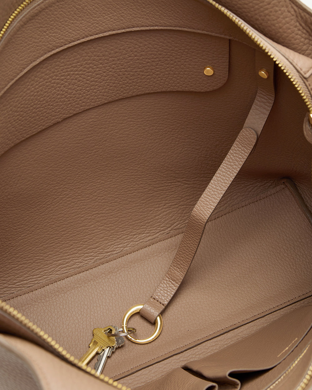 Open bag interior with keyring and keys attached