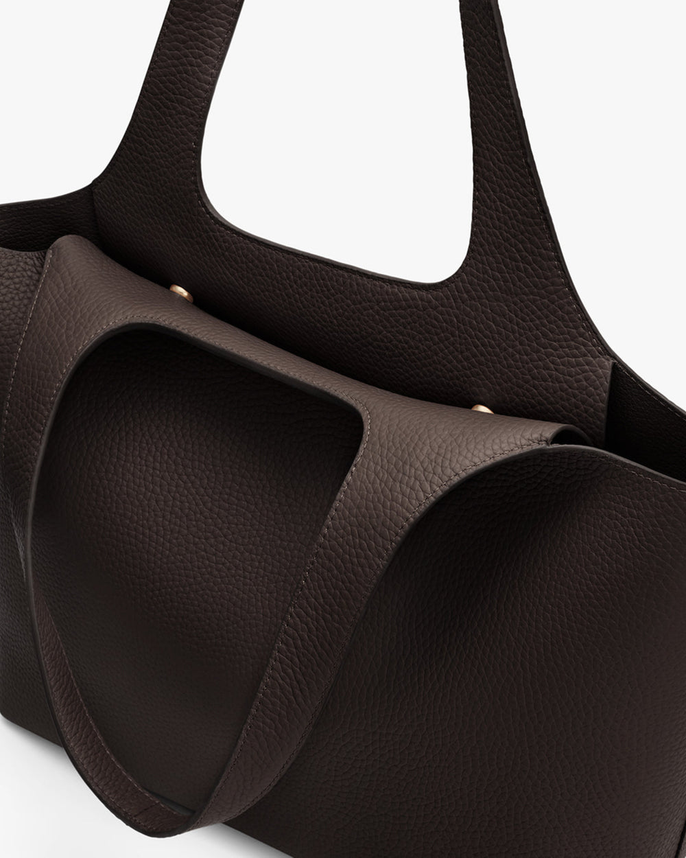 Tote bag with textured finish and structured handles.
