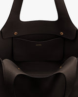 Open interior view of a bag with a pocket inside