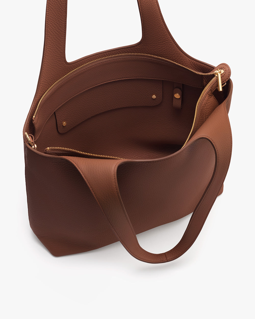 Open tote bag with handles and pockets inside.