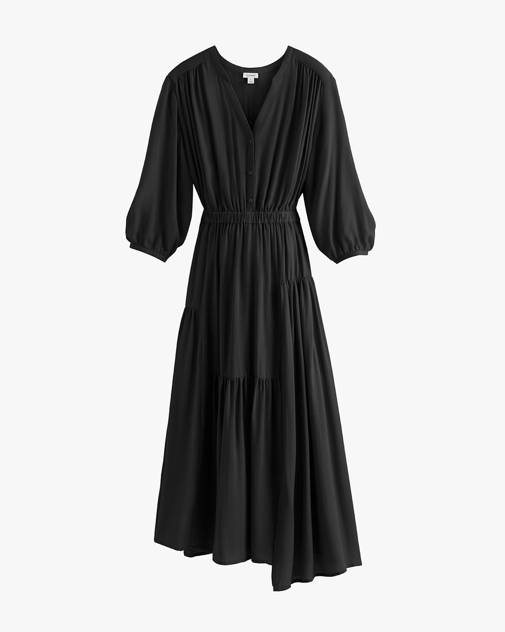 Long dress with button front and gathered waist hanging on a hanger