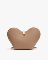 Heart-shaped handbag with a zipper on top.