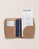 Open wallet with cards and boarding pass visible.
