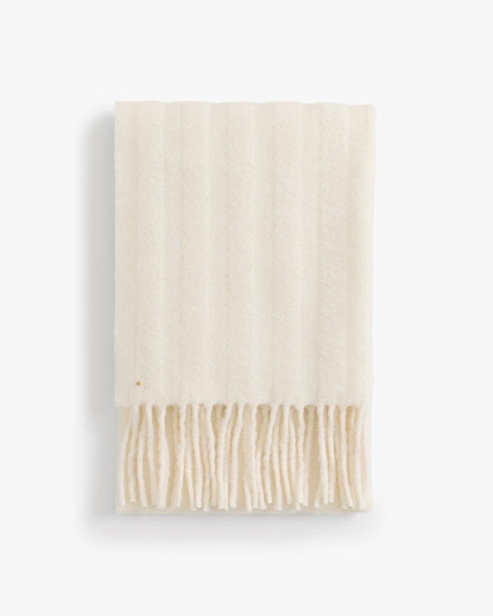 Fringed scarf folded neatly in a vertical view.