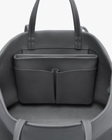 Open travel bag with interior pocket.