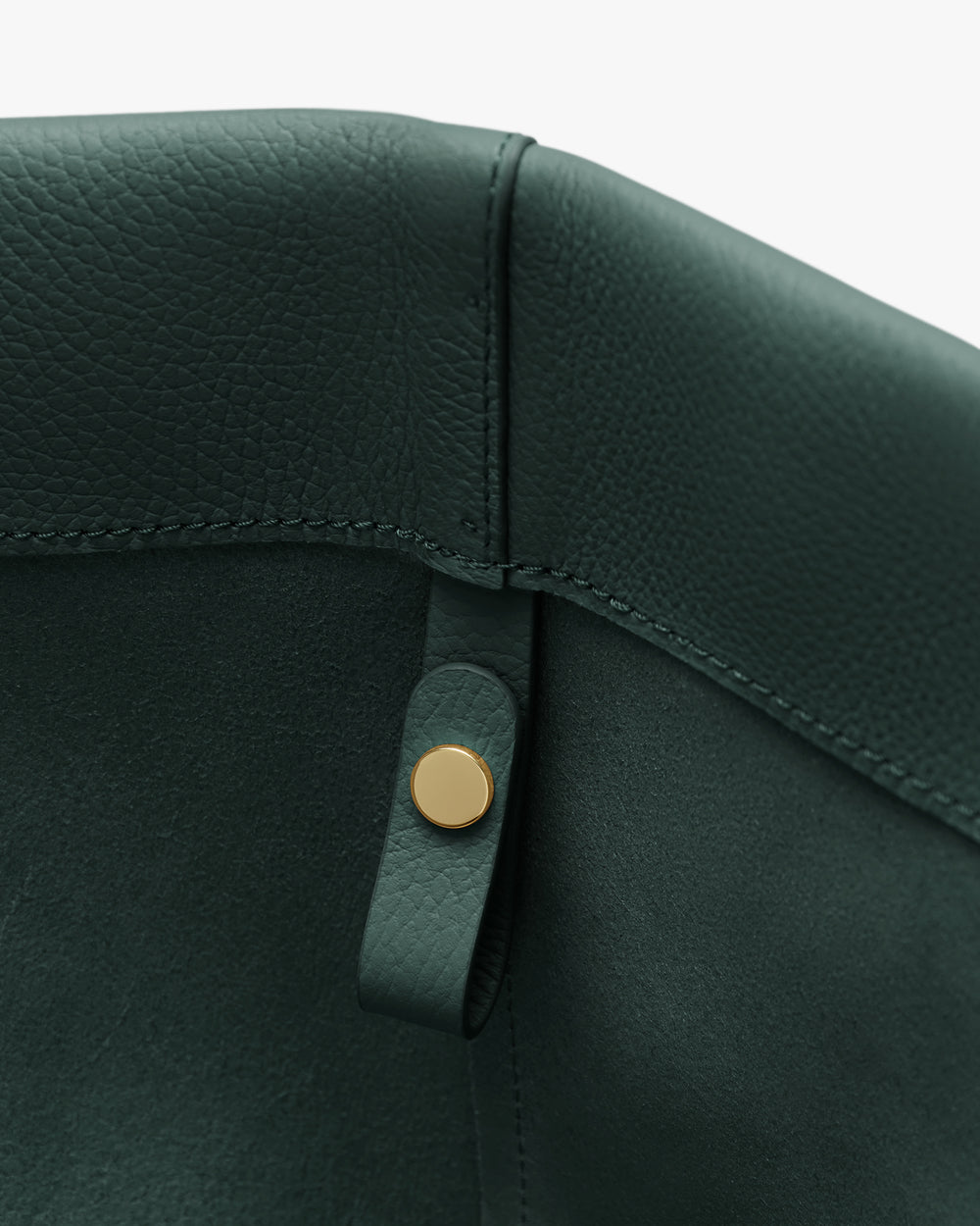 Close-up of tote interior with small loop and button.