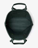 Open handbag seen from above with handles on sides