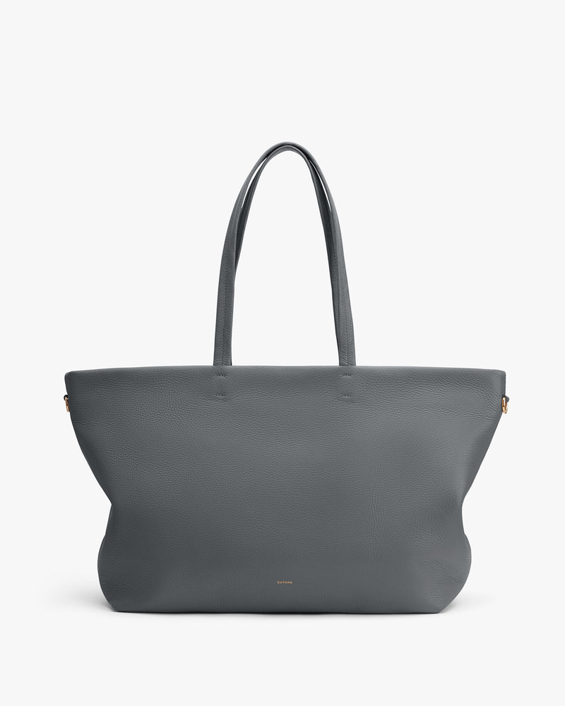 Tote bag with long handles and minimal design.