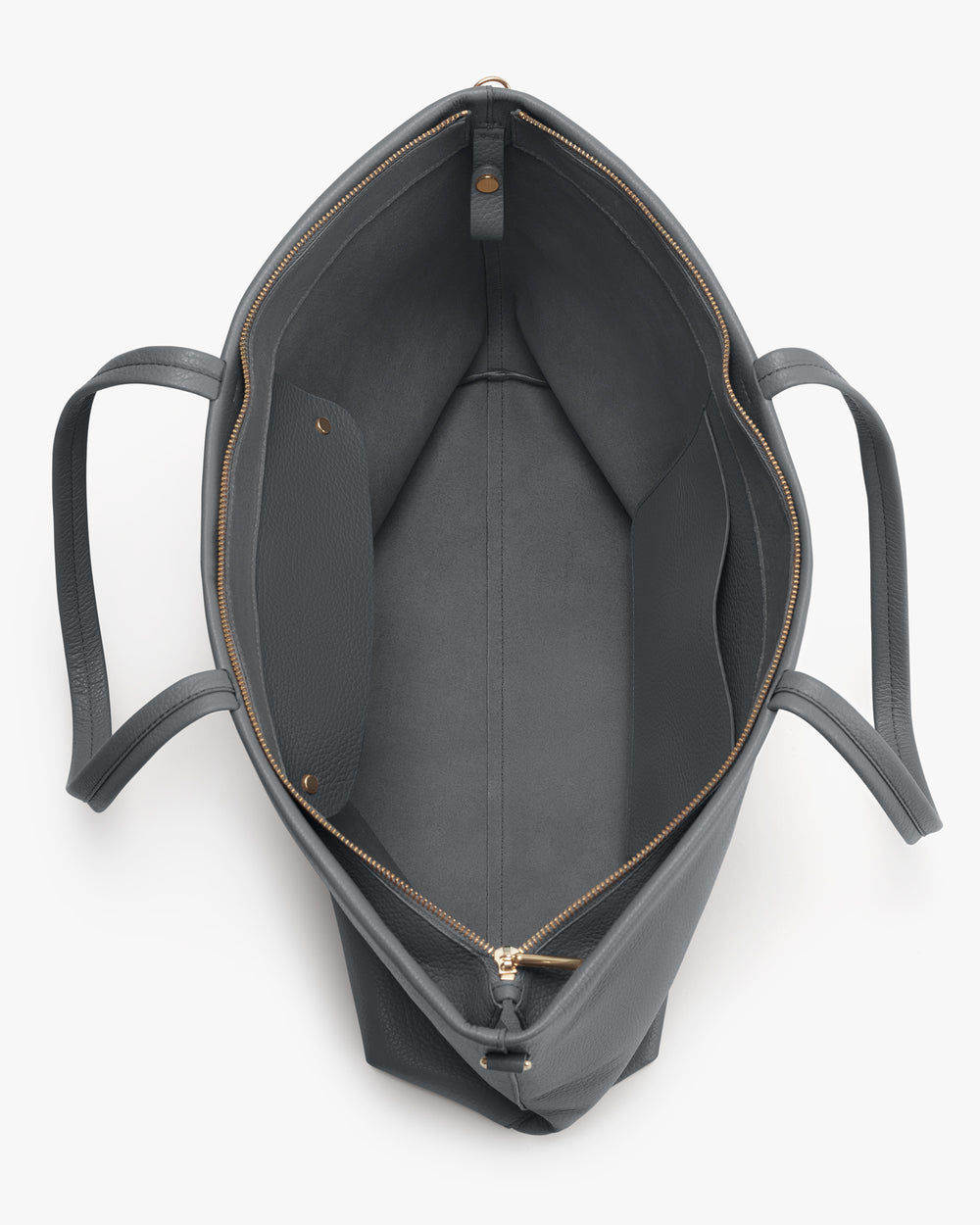 Open handbag with multiple pockets and a zipper closure