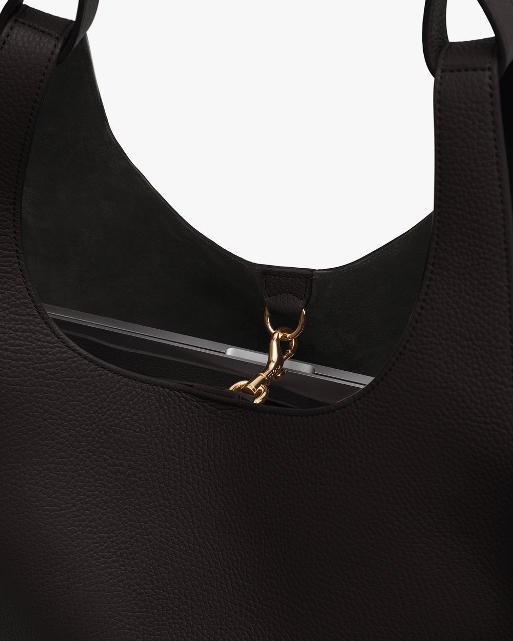 Close-up of a tote bag with a zip closure and handles.