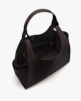 Large open tote bag with interior pockets and wide handles