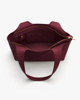 Open tote bag with a zipper.