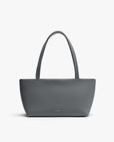 Tote bag with a simple design and two handles displayed upright.